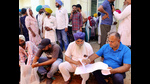 Candidates check their documents before filing the nomination papers in Patiala on Friday. (ANI) Candidates check their documents before filing the nomination papers in Patiala on Friday. (ANI)