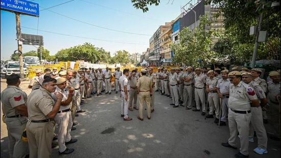 Police deployment at the site where the statue of Rani Laxmi Bai has been relocated near Shahi Idgah on Thursday. (Sanchit Khanna/HT Photo) Police deployment at the site where the statue of Rani Laxmi Bai has been relocated near Shahi Idgah on Thursday. (Sanchit Khanna/HT Photo)