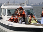 Sambhajiraje, who once was a BJP Rajya Sabha MP, attempted to inspect the proposed site by going into the Arabian Sea. Since boats are not allowed there, he used binoculars to see if any work was in progress. (Anshuman Poyrekar/ Hindustan Times) Sambhajiraje, who once was a BJP Rajya Sabha MP, attempted to inspect the proposed site by going into the Arabian Sea. Since boats are not allowed there, he used binoculars to see if any work was in progress. (Anshuman Poyrekar/ Hindustan Times)