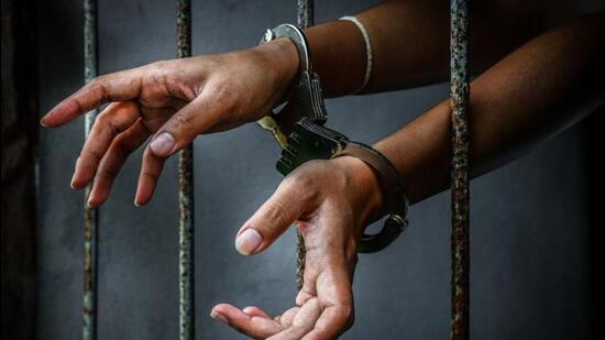 Prisoner in prison with handcuff (Getty Images/iStockphoto) Prisoner in prison with handcuff (Getty Images/iStockphoto)