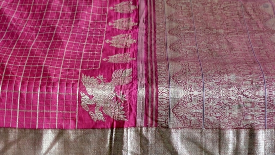 Woven in pure silk and adorned with intricate gold zari, the sari captures the elegance of the Mysore Palace.(TH) Woven in pure silk and adorned with intricate gold zari, the sari captures the elegance of the Mysore Palace.(TH)