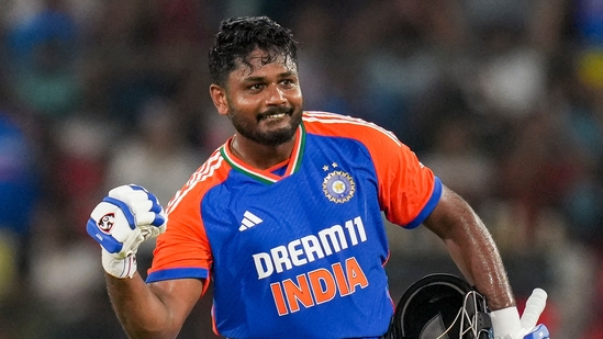 India's Sanju Samson celebrates his maiden century during the third and final T20I. His knock was studded with 11 fours and eight sixes after India elected to bat first in Hyderabad.(PTI)