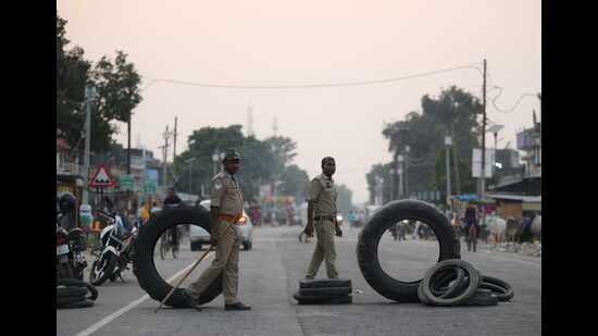 Cops barricade a road in Bahraich on Monday. (Deepak Gupta/HT) Cops barricade a road in Bahraich on Monday. (Deepak Gupta/HT)