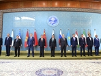 In this photo released by the Press Information Department, Pakistan's Prime Minister Shehbaz Sharif, center, China's Premier Li Qiang, fifth left, Belarus Prime Minister Roman Golovchenko, fourth left, Russian Prime Minister Mikhail Mishustin, sixth right, Kazakhstan's Prime Minister Olzhas Bektenov, fifth right, Tajikistan's Prime Minister Kokhir Rasulzoda, fourth right, and other leaders pose for group photo at the opening session of Shanghai Cooperation Organization (SCO) meeting in Islamabad, Pakistan, Wednesday, Oct. 16, 2024. AP/PTI(AP10_16_2024_000072B)(AP) In this photo released by the Press Information Department, Pakistan's Prime Minister Shehbaz Sharif, center, China's Premier Li Qiang, fifth left, Belarus Prime Minister Roman Golovchenko, fourth left, Russian Prime Minister Mikhail Mishustin, sixth right, Kazakhstan's Prime Minister Olzhas Bektenov, fifth right, Tajikistan's Prime Minister Kokhir Rasulzoda, fourth right, and other leaders pose for group photo at the opening session of Shanghai Cooperation Organization (SCO) meeting in Islamabad, Pakistan, Wednesday, Oct. 16, 2024. AP/PTI(AP10_16_2024_000072B)(AP)