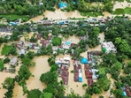 An aerial view shows partially submerged houses after flood in Feni, Bangladesh on August 24 (AFP) An aerial view shows partially submerged houses after flood in Feni, Bangladesh on August 24 (AFP)