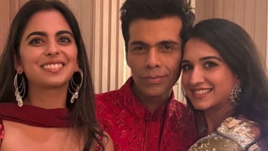 Isha Ambani (L) and Radhika Merchant (R) with Karan Johar at Manish Malhotra's Diwali party. Isha Ambani (L) and Radhika Merchant (R) with Karan Johar at Manish Malhotra's Diwali party.