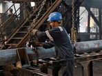 FILE PHOTO: An employee prepares to move a heavy bar of steel inside the ArcVac ForgeCast factory, in Hooghly district, in the eastern state of West Bengal, India, April 26, 2024. REUTERS/Sahiba Chawdhary/File Photo (REUTERS) FILE PHOTO: An employee prepares to move a heavy bar of steel inside the ArcVac ForgeCast factory, in Hooghly district, in the eastern state of West Bengal, India, April 26, 2024. REUTERS/Sahiba Chawdhary/File Photo (REUTERS)