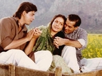 Shah Rukh Khan, Rakhee and Salman Khan in a still from Karan Arjun. Shah Rukh Khan, Rakhee and Salman Khan in a still from Karan Arjun.