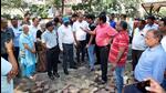 Acting in compliance with NGT directives citing environmental concerns associated with concrete covered surfaces, Noida authority on Monday began removing tiles from footpaths. But RWA members objected, citing possible dust pollution due to it. (HT Photo) Acting in compliance with NGT directives citing environmental concerns associated with concrete covered surfaces, Noida authority on Monday began removing tiles from footpaths. But RWA members objected, citing possible dust pollution due to it. (HT Photo)