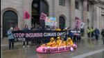 Climate activists protest in London on Monday. (Bloomberg Photo) Climate activists protest in London on Monday. (Bloomberg Photo)