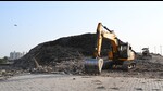 Major chaos had erupted in June after the then local bodies secretary Ajoy Sharma directed the Mohali MC to stop dumping waste at the Phase-8B landfill in the wake of Punjab and Haryana high court’s directions to adopt bioremediation measures at the site, where a mountain of legacy waste is visible even at a distance. (HT Photo) Major chaos had erupted in June after the then local bodies secretary Ajoy Sharma directed the Mohali MC to stop dumping waste at the Phase-8B landfill in the wake of Punjab and Haryana high court’s directions to adopt bioremediation measures at the site, where a mountain of legacy waste is visible even at a distance. (HT Photo)