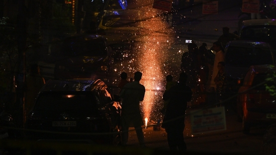 People burst crackers on the occasion of Diwali at Pandav Nagar in New Delhi on October 31.(Ajay Aggarwal/ Hindustan Times) People burst crackers on the occasion of Diwali at Pandav Nagar in New Delhi on October 31.(Ajay Aggarwal/ Hindustan Times)