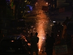 People burst crackers on the occasion of Diwali at Pandav Nagar in New Delhi on October 31. The city's air quality dropped to the People burst crackers on the occasion of Diwali at Pandav Nagar in New Delhi on October 31. The city's air quality dropped to the