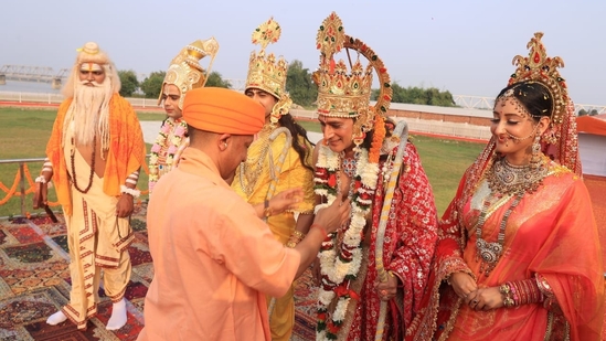 Chief Minister Yogi Adityanath on Thursday visited the new Ram temple in Ayodhya and offered prayers on Diwali. The chief minister also visited the Hanuman Garhi temple as well. He also greeted artists who embodied Lord Ram and Seeta.(Deepak Gupta/Hindustan Times)