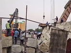 A structure at the construction site near Vasad gave way, causing a portion of the bridge to crash down. (PTI) A structure at the construction site near Vasad gave way, causing a portion of the bridge to crash down. (PTI)