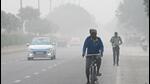 Commuters out on a hazy morning in Noida on Wednesday. (Sunil Ghosh/HT PHOTO) Commuters out on a hazy morning in Noida on Wednesday. (Sunil Ghosh/HT PHOTO)