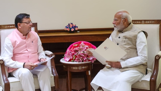 Uttarakhand chief minister Pushkar Singh Dhami with Prime Minister Narendra Modi. Uttarakhand chief minister Pushkar Singh Dhami with Prime Minister Narendra Modi.