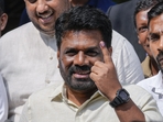 Sri Lankan President Anura Kumara Dissanayake shows his finger as he leaves after casting his vote during the parliamentary election in Colombo, Sri Lanka, Thursday, Nov. 14, 2024.(AP) Sri Lankan President Anura Kumara Dissanayake shows his finger as he leaves after casting his vote during the parliamentary election in Colombo, Sri Lanka, Thursday, Nov. 14, 2024.(AP)