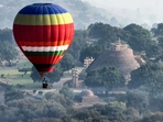 Raisen, Nov 13 (ANI): A hot air balloon flies in the air over UNESCO's world heritage site Sanchi Stupas during a hot air balloon show. (ANI Photo) (Sanjeev Gupta) Raisen, Nov 13 (ANI): A hot air balloon flies in the air over UNESCO's world heritage site Sanchi Stupas during a hot air balloon show. (ANI Photo) (Sanjeev Gupta)