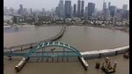 FILE PHOTO: FILE PHOTO: A drone view shows a bowstring arch bridge, installed by Hindustan Construction Company, that will connect the Bandra-Worli sea link and the coastal road in Mumbai, India, April 26, 2024. REUTERS/Francis Mascarenhas/File Photo/File Photo (REUTERS) FILE PHOTO: FILE PHOTO: A drone view shows a bowstring arch bridge, installed by Hindustan Construction Company, that will connect the Bandra-Worli sea link and the coastal road in Mumbai, India, April 26, 2024. REUTERS/Francis Mascarenhas/File Photo/File Photo (REUTERS)