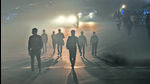 People walk through dense smog at Kartavya Path on Tuesday evening. (RAJ K RAJ /HT PHOTO) People walk through dense smog at Kartavya Path on Tuesday evening. (RAJ K RAJ /HT PHOTO)