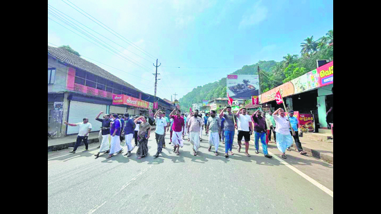 Supporters of the CPM take part in a demonstration in Wayanad on Tuesday. (HT Photo) Supporters of the CPM take part in a demonstration in Wayanad on Tuesday. (HT Photo)