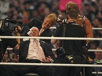 Donald Trump shaves Vince McMahon's head at WrestleMania 23 in front of 81000 people(Getty) Donald Trump shaves Vince McMahon's head at WrestleMania 23 in front of 81000 people(Getty)