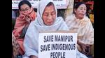 Women from Lamlai village and Chalou village stage a sit-in protest in Imphal East against the violence and tension in Manipur. (ANI Photo) Women from Lamlai village and Chalou village stage a sit-in protest in Imphal East against the violence and tension in Manipur. (ANI Photo)