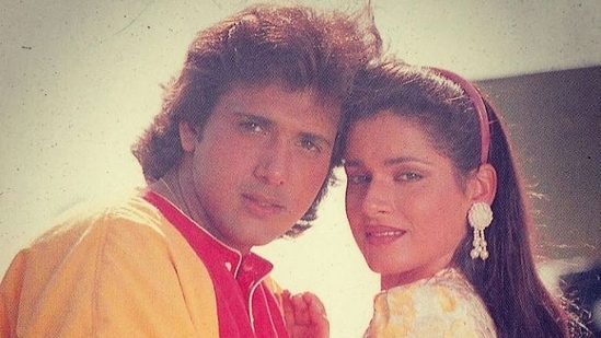 Govinda and Neelam in a still from the film Ilzaam. Govinda and Neelam in a still from the film Ilzaam.
