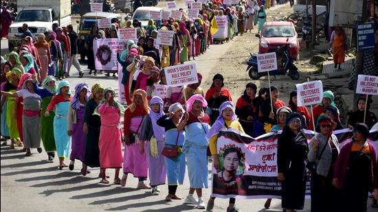 Demonstrators hold placards as they take part in a protest rally against recent killings and reimposition of the Armed Forces Special Powers Act (AFSPA) in six police station areas of Manipur. (REUTERS) Demonstrators hold placards as they take part in a protest rally against recent killings and reimposition of the Armed Forces Special Powers Act (AFSPA) in six police station areas of Manipur. (REUTERS)