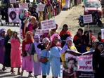 Demonstrators hold placards as they take part in a protest rally against recent killings and reimposition of the Armed Forces Special Powers Act (AFSPA) in six police station areas of Manipur. (REUTERS) Demonstrators hold placards as they take part in a protest rally against recent killings and reimposition of the Armed Forces Special Powers Act (AFSPA) in six police station areas of Manipur. (REUTERS)