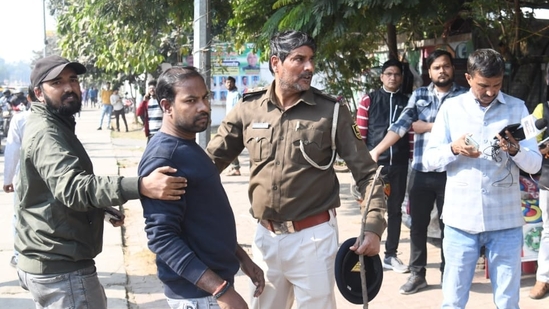 The Bihar Police registered a case against agitating students who attempted to block the movement of traffic on Bailey Road near the BPSC office and arrested student leader Dilip Kumar for attempting to organise a protest in the restricted area. (Photo credit: Santosh Kumar) The Bihar Police registered a case against agitating students who attempted to block the movement of traffic on Bailey Road near the BPSC office and arrested student leader Dilip Kumar for attempting to organise a protest in the restricted area. (Photo credit: Santosh Kumar)