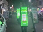 The image shows three men walking down a Bengaluru street advertising for 10-minute food delivery app.(X/@roshanonline) The image shows three men walking down a Bengaluru street advertising for 10-minute food delivery app.(X/@roshanonline)