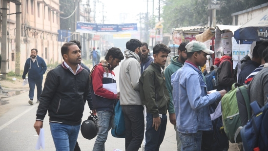 Applicants waiting in a queue before entering appearing for the Railway Recruitment Board exam at ION Digital zone in Patna. (Santosh Kumar )