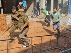 Protesters clashing with police as the stir against the proposed ropeway project at the Vaishno Devi shrine at Katra turned violent. (PTI)(HT_PRINT) Protesters clashing with police as the stir against the proposed ropeway project at the Vaishno Devi shrine at Katra turned violent. (PTI)(HT_PRINT)