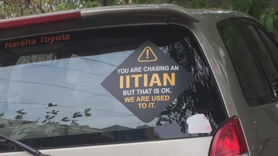 The car had a sticker on the right with a message for the person waiting behind the vehicle. "You are chasing an IITian but that is ok. We are used to it"(Reddit/Then_Macaroon_7780) The car had a sticker on the right with a message for the person waiting behind the vehicle. "You are chasing an IITian but that is ok. We are used to it"(Reddit/Then_Macaroon_7780)