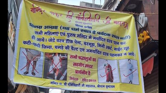 A banner with an appeal to devotees to turn up in decent clothes. (HT Photo)