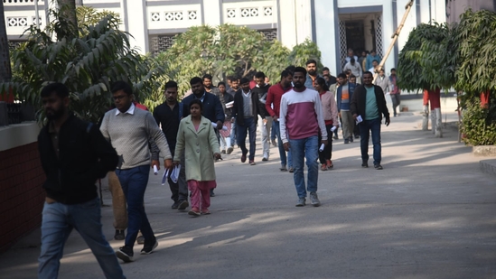 Candidates who appeared for the test coming out of Bankipur Girls High School in Patna where BPSC Assistant Engineer competitive exam Day 2 was held. (Santosh Kumar)