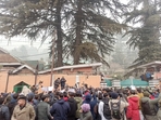 Hundreds of students, along with NC MP Ruhulla Mehdi, and other political leaders gathered outside CM Omar Abdullah's residence for the protest. (Waseem Andrabi/HT) Hundreds of students, along with NC MP Ruhulla Mehdi, and other political leaders gathered outside CM Omar Abdullah's residence for the protest. (Waseem Andrabi/HT)