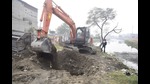 Pipes of dairy units being uprooted in Jamalpur. (HT Photo) Pipes of dairy units being uprooted in Jamalpur. (HT Photo)