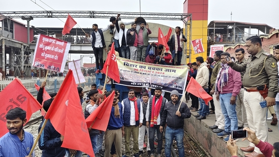 AISA activists block a train during Chakka Jam regarding the demands of BPSC candidates in Arrah. AISA activists block a train during Chakka Jam regarding the demands of BPSC candidates in Arrah.