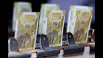 FILE PHOTO: Indian twenty rupee currency notes are displayed at a roadside currency exchange stall in New Delhi, India, May 24, 2024. REUTERS/Priyanshu Singh//File Photo (REUTERS) FILE PHOTO: Indian twenty rupee currency notes are displayed at a roadside currency exchange stall in New Delhi, India, May 24, 2024. REUTERS/Priyanshu Singh//File Photo (REUTERS)