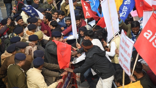 Police officers are seen stopping various students organisations during Mukhyamantri gherao march at JP roundabout demanding the cancellation of the 70th Integrated Combined Competitive (Preliminary) Examination (CCE), 2024. (Santosh Kumar)