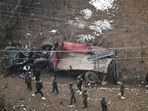 Army soldiers near the damaged army vehicle at Wular viewpoint in Bandipora district.(Waseem Andrabi /Hindustan Times) Army soldiers near the damaged army vehicle at Wular viewpoint in Bandipora district.(Waseem Andrabi /Hindustan Times)