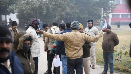BPSC 70th Prelims Re-Exam to be held on January 4. Applicants waiting outside exam centre at Mahath Hanuman Sharn high School, in Patna. (Santosh Kumar )
