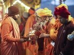 Sadhus performing an evening 'Aarti' on the banks of Sangam, the confluence of the Ganga, Yamuna and the Saraswati rivers.
(PTI Photo) Sadhus performing an evening 'Aarti' on the banks of Sangam, the confluence of the Ganga, Yamuna and the Saraswati rivers.
(PTI Photo)
