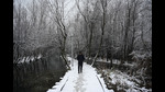 A man waling on snow covered bridge in Srinagar. (Waseem Andrabi /HT) A man waling on snow covered bridge in Srinagar. (Waseem Andrabi /HT)