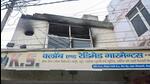 Rohit managed to exit the shop from the first floor, believing that he would open the shutter lock from outside on the ground floor and rescue his wife. But when he opened the door, Vineeta had reached the first floor, where she fell unconscious, an officer said. (Sunil Ghosh/HT Photo) Rohit managed to exit the shop from the first floor, believing that he would open the shutter lock from outside on the ground floor and rescue his wife. But when he opened the door, Vineeta had reached the first floor, where she fell unconscious, an officer said. (Sunil Ghosh/HT Photo)