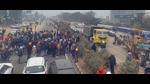 Residents of Hasanpur village block traffic on the Ludhiana-Ferozepur Road near Mullanpur after a pack of dogs mauled a 11-year- old boy to death on Saturday. (HT PHOTO) Residents of Hasanpur village block traffic on the Ludhiana-Ferozepur Road near Mullanpur after a pack of dogs mauled a 11-year- old boy to death on Saturday. (HT PHOTO)