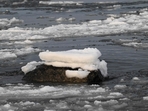 Snow covers a rock as drifting broken sea ice, floats on the surface, off the extreme western point of Replot Island, in Kvarken archipelago, near Bjorkoby, in the northern part of the Baltic Sea on January 15, 2025. Due to a mild winter and temperatures above zero degrees centigrade, the open sea has not frozen. (Photo by Olivier MORIN / AFP)(AFP) Snow covers a rock as drifting broken sea ice, floats on the surface, off the extreme western point of Replot Island, in Kvarken archipelago, near Bjorkoby, in the northern part of the Baltic Sea on January 15, 2025. Due to a mild winter and temperatures above zero degrees centigrade, the open sea has not frozen. (Photo by Olivier MORIN / AFP)(AFP)